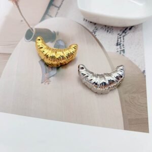Elegant Croissant Gold Brooch